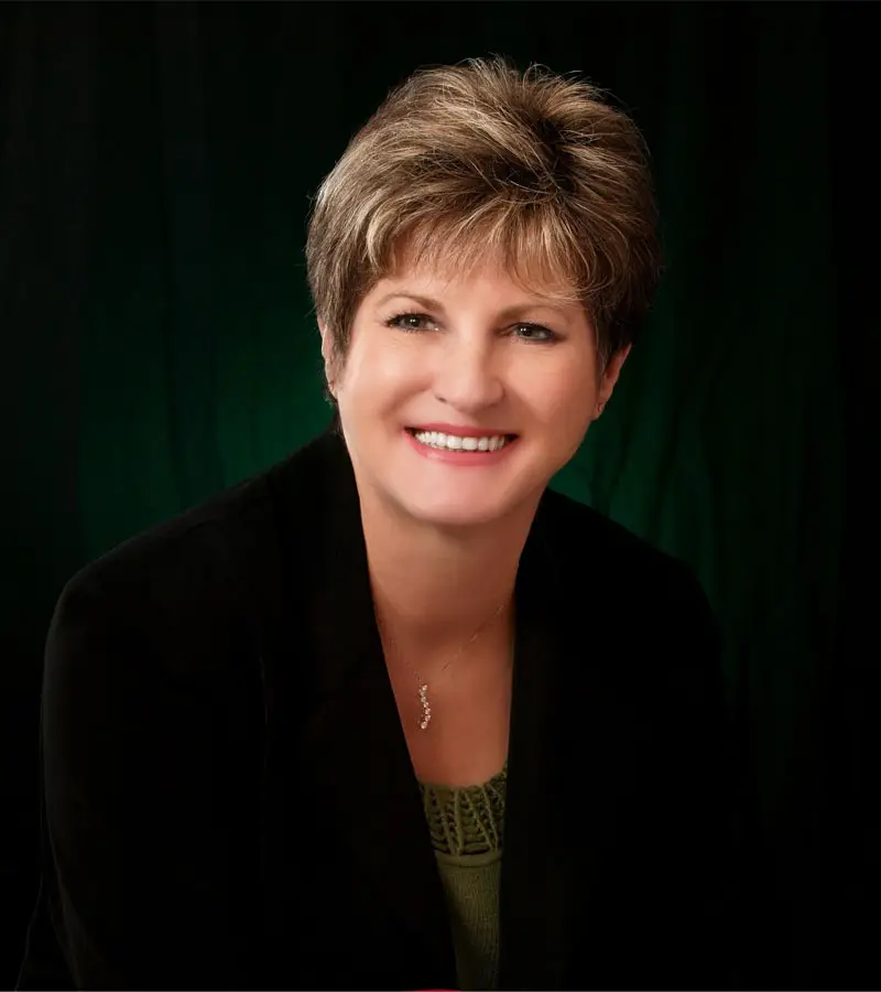about us - headshot of Cathy Wallis