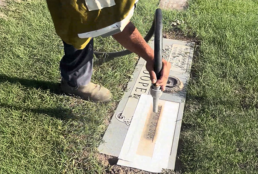 a cemetery on site memorial engraving project