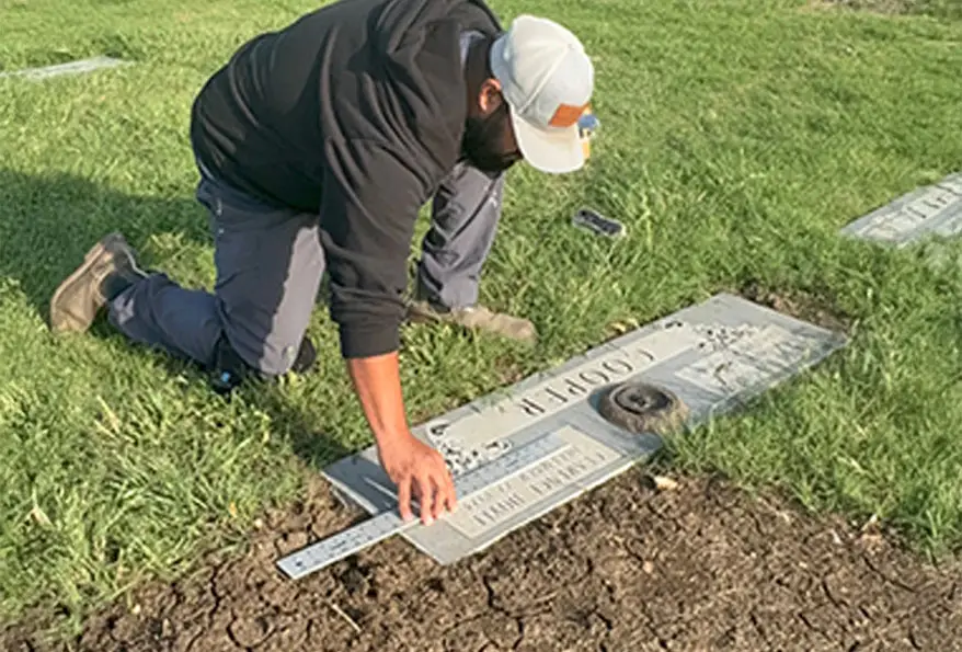 a cemetery on site memorial engraving project